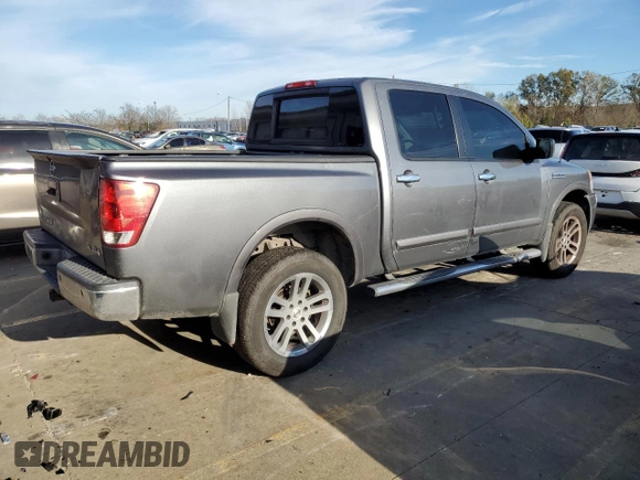 2013 Nissan Titan SV with VIN 1N6AA0EC9DN311176, listed as a Copart auction lot 79391214 with 99,085 mi miles and Salvage title. Bid and sale history available at DreamBid. Image 3.