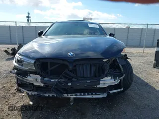 2017 BMW 5 Series 540i with VIN WBAJE5C33HG913604, listed as a IAAI auction lot 41559239 with 107,160 mi miles and . Bid and sale history available at carsss.com. Image 6.