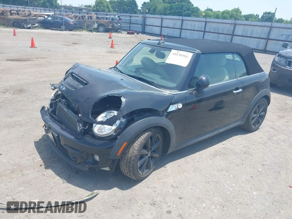 2013 MINI Convertible S with VIN WMWZP3C59DT550746, listed as a IAAI auction lot 39538986 with 59,934 mi miles and . Bid and sale history available at DreamBid. Image 2.