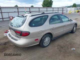 1998 Ford Taurus with VIN 1FAFP57U8WG275844, listed as a IAAI auction lot 42426107 with 318,654 mi miles and . Bid and sale history available at DreamBid. Image 4.