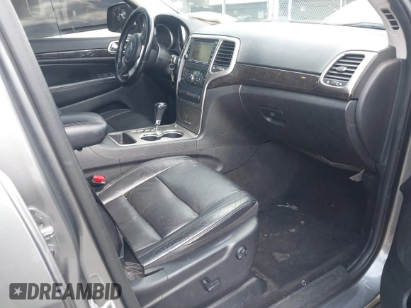2011 Jeep Grand Cherokee Laredo with VIN 1J4RR4GG7BC736694, listed as a IAAI auction lot 42758461 with 159,875 mi miles and . Bid and sale history available at DreamBid. Image 5.