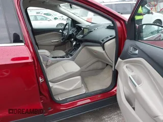 2014 Ford Escape SE with VIN 1FMCU9GX7EUC35483, listed as a IAAI auction lot 41704298 with 105,017 mi miles. Bid and sale history available at carsss.com. Image 5.