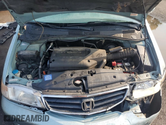 2003 Honda Odyssey EX-L с VIN 2HKRL18033H501741, выставлен на аукционе Copart как лот 60496865 с пробегом Не указан миль и Списание • Salvage title. История ставок и продаж доступна на DreamBid. Изображение 12.