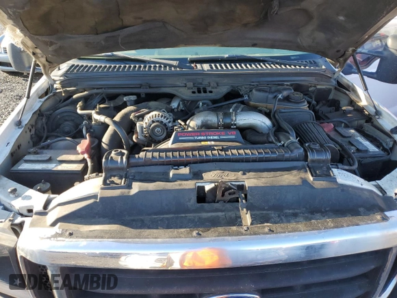 2003 Ford F-350 XL with VIN 1FTSX31P63EB62658, listed as a Copart auction lot 84054284 with 227,705 mi miles and Salvage Title. Bid and sale history available at DreamBid. Image 11.