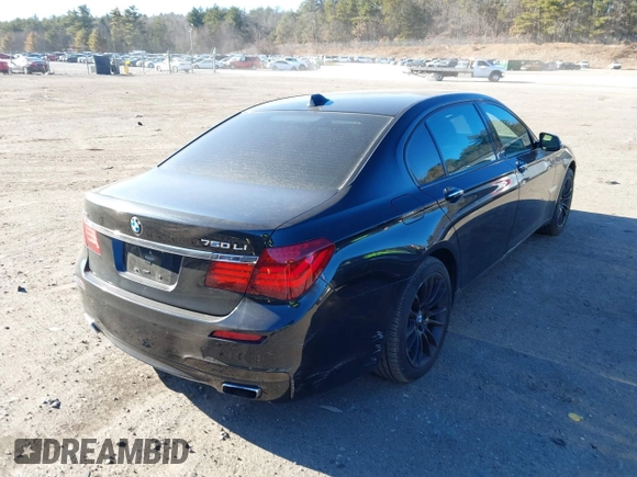 2015 BMW 7 Series 750Li xDrive with VIN WBAYF8C56FD654698, listed as a IAAI auction lot 41229313 with 120,238 mi miles and . Bid and sale history available at carsss.com. Image 4.