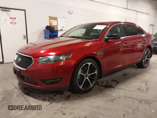 2014 Ford Taurus SHO with VIN 1FAHP2KT9EG130834, listed as a IAAI auction lot 41748199 with 98,857 mi miles and . Bid and sale history available at carsss.com. Image 2.