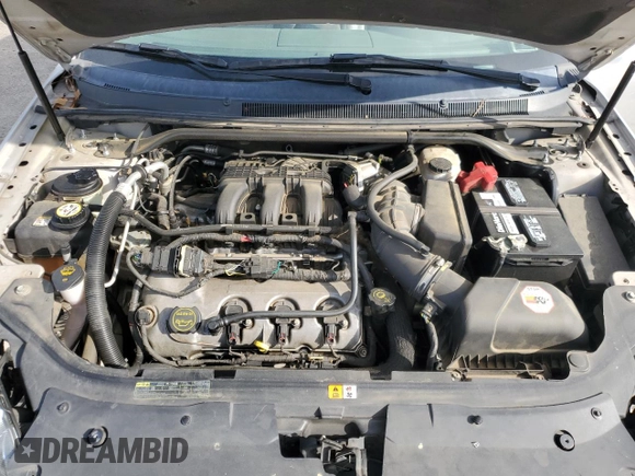 2008 Mercury Sable with VIN 1MEHM40W38G621379, listed as a Copart auction lot 54855085 with 107,443 mi miles and Salvage title. Bid and sale history available at DreamBid. Image 11.