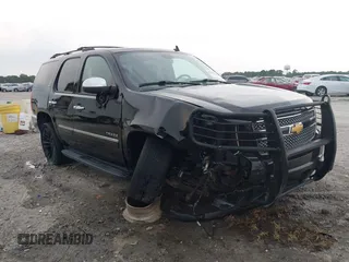 2012 Chevrolet Tahoe LTZ with VIN 1GNSKCE05CR292846, listed as a IAAI auction lot 42585464 with 277,198 mi miles and . Bid and sale history available at DreamBid. Image 1.