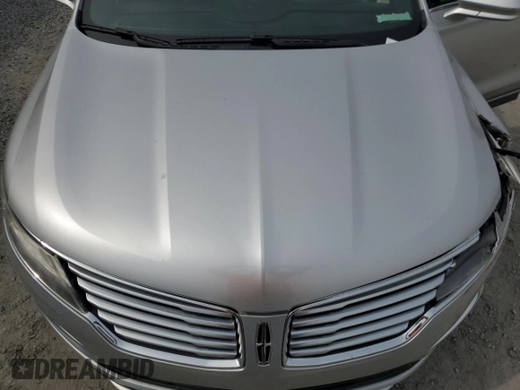 2017 Lincoln MKC Premiere with VIN 5LMCJ1C91HUL32617, listed as a Copart auction lot 57444215 with 106,285 mi miles and Salvage title. Bid and sale history available at DreamBid. Image 12.