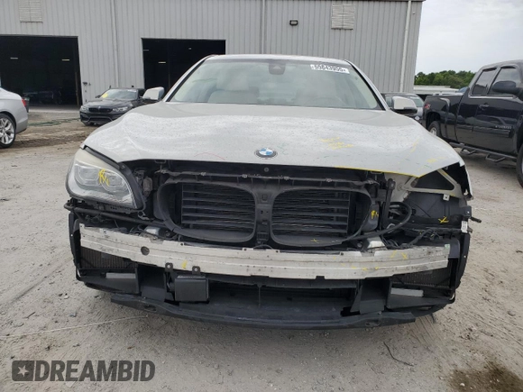 2015 BMW 7 Series 750Li z VIN WBAYE8C56FD781213, wystawiony jako Copart lot #55843955 z przebiegiem 63 899 mil mil oraz Szkoda całkowita • Salvage title. Historia ofert i sprzedaży dostępna na DreamBid. Obrazek 5.