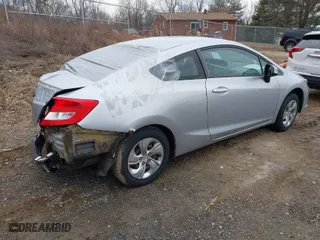 2013 Honda Civic Cpe LX with VIN 2HGFG3A59DH518192, listed as a IAAI auction lot 41652389 with 138,257 mi miles. Bid and sale history available at carsss.com. Image 4.