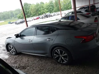 2018 Nissan Maxima Platinum z VIN 1N4AA6AP4JC390235, wystawiony jako IAAI lot #42376364 z przebiegiem 152 293 mil mil oraz . Historia ofert i sprzedaży dostępna na DreamBid. Obrazek 14.