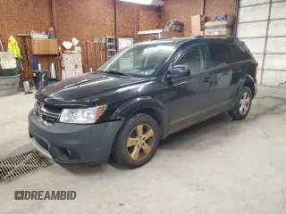 2012 Dodge Journey SXT z VIN 3C4PDCBG8CT188188, wystawiony jako Copart lot #60833275 z przebiegiem 153 075 mil mil oraz Czysty tytuł • Clean title. Historia ofert i sprzedaży dostępna na DreamBid. Obrazek 1.