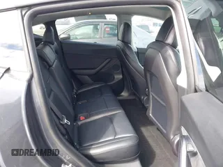 2021 Tesla Model Y Long Range with VIN 5YJYGDEE6MF209034, listed as a IAAI auction lot 41896238 with 53,401 mi miles. Bid and sale history available at carsss.com. Image 8.