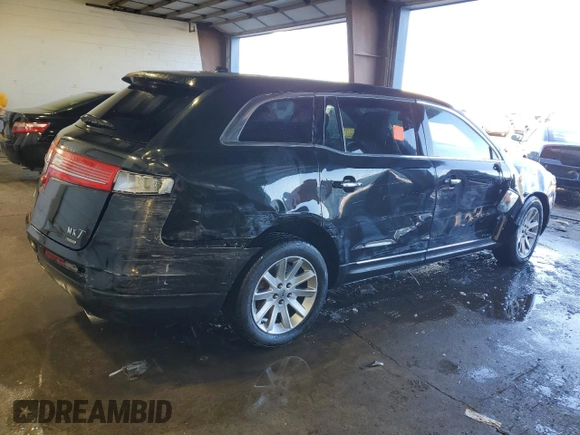 2015 Lincoln MKT with VIN 2LMHJ5NK4FBL01062, listed as a Copart auction lot 46111995 with 76,509 mi miles and Salvage Title. Bid and sale history available at DreamBid. Image 3.