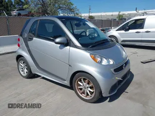 2016 Smart fortwo Passion with VIN WMEEJ9AA0GK844523, listed as a IAAI auction lot 41998342 with Not provided miles and . Bid and sale history available at DreamBid. Image 1.