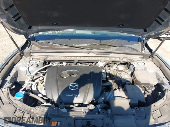 2023 Mazda CX-50 S Premium Plus with VIN 7MMVABEM8PN108020, listed as a IAAI auction lot 42203568 with 26,783 mi miles and . Bid and sale history available at DreamBid. Image 10.