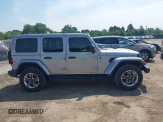 2019 Jeep Wrangler Unlimited Sahara with VIN 1C4HJXEN5KW542403, listed as a IAAI auction lot 42524989 with 60,451 mi miles and . Bid and sale history available at DreamBid. Image 13.
