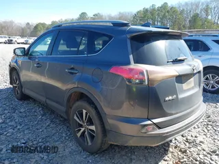 2018 Toyota RAV4 XLE with VIN 2T3WFREV2JW450019, listed as a IAAI auction lot 41704084 with 257,737 mi miles. Bid and sale history available at carsss.com. Image 3.