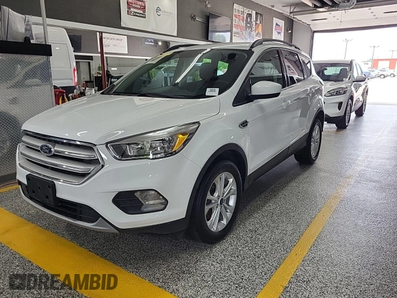 2018 Ford Escape SE z VIN 1FMCU9GD3JUC89119, wystawiony jako IAAI lot #42421139 z przebiegiem 42 209 mil mil oraz . Historia ofert i sprzedaży dostępna na DreamBid. Obrazek 8.