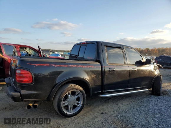 2002 Ford F-150 Harley Davidson with VIN 1FTRW07342KC24210, listed as a Copart auction lot 78489224 with 203,508 mi miles and Salvage Title. Bid and sale history available at carsss.com. Image 3.