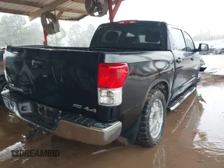 2012 Toyota Tundra 4WD Truck with VIN 5TFDW5F1XCX253223, listed as a IAAI auction lot 41453842 with 163,730 mi miles. Bid and sale history available at carsss.com. Image 4.
