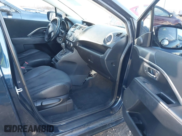 2014 Mazda 5 Grand Touring z VIN JM1CW2DL7E0175624, wystawiony jako IAAI lot #41469852 z przebiegiem 118 698 mil mil oraz . Historia ofert i sprzedaży dostępna na DreamBid. Obrazek 5.