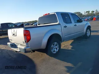 2009 Nissan Frontier SE with VIN 1N6AD07U99C416784, listed as a IAAI auction lot 41400764 with 190,791 mi miles and . Bid and sale history available at DreamBid. Image 4.
