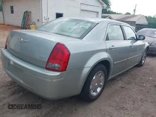 2006 Chrysler 300 Touring with VIN 2C3KA53G06H164188, listed as a IAAI auction lot 42079830 with 165,321 mi miles. Bid and sale history available at carsss.com. Image 4.