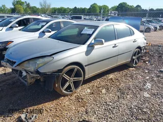 2004 Lexus ES 350 with VIN JTHBA30G440013021, listed as a IAAI auction lot 42064376 with 171,206 mi miles and . Bid and sale history available at DreamBid. Image 2.