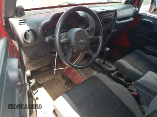 2007 Jeep Wrangler X with VIN 1J4FA24197L185416, listed as a Copart auction lot 59943735 with 147,984 mi miles and Salvage title. Bid and sale history available at DreamBid. Image 8.