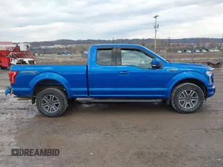 2015 Ford F-150 XLT with VIN 1FTFX1EF7FFA69069, listed as a IAAI auction lot 41660564 with 98,300 mi miles. Bid and sale history available at carsss.com. Image 14.
