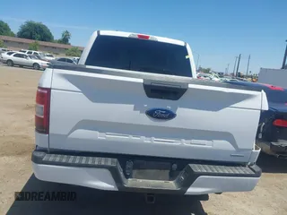 2018 Ford F-150 XL with VIN 1FTEW1EP8JKF82063, listed as a IAAI auction lot 42299414 with 153,706 mi miles and . Bid and sale history available at DreamBid. Image 17.