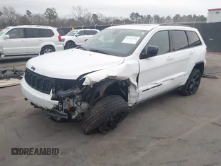 2018 Jeep Grand Cherokee Laredo E with VIN 1C4RJFAG2JC503130, listed as a IAAI auction lot 41527333 with 95,669 mi miles. Bid and sale history available at carsss.com. Image 17.
