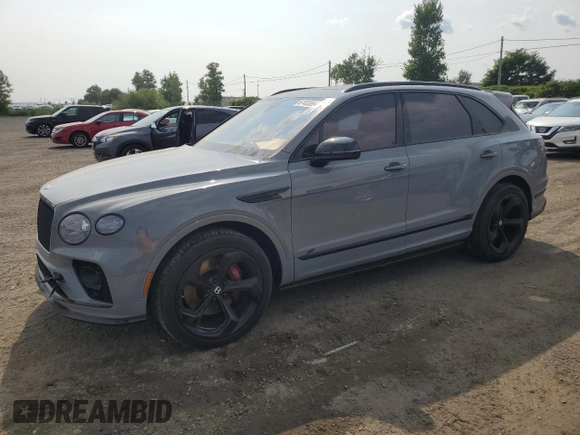2022 Bentley Bentayga V8 z VIN SJAAM2ZVXNC013736, wystawiony jako Copart lot #67453664 z przebiegiem 22 660 mil mil oraz Nie do naprawy. Historia ofert i sprzedaży dostępna na DreamBid. Obrazek 1.