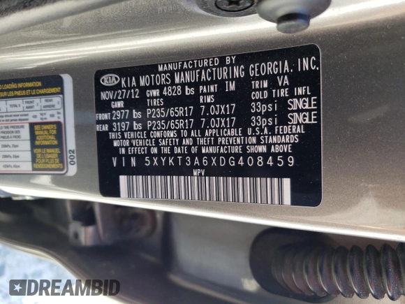 2013 Kia Sorento LX z VIN 5XYKT3A6XDG408459, wystawiony jako Copart lot #52556785 z przebiegiem 195 680 mil mil oraz Szkoda całkowita • Salvage title. Historia ofert i sprzedaży dostępna na DreamBid. Obrazek 14.