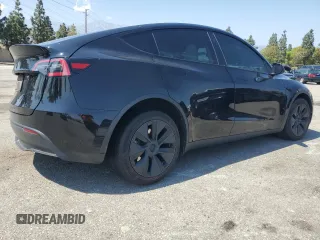2024 Tesla Model Y z VIN 7SAYGDED8RF123516, wystawiony jako Copart lot #55354655 z przebiegiem 12 521 mil mil oraz Szkoda całkowita • Salvage title. Historia ofert i sprzedaży dostępna na DreamBid. Obrazek 3.