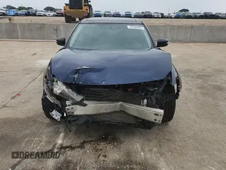 2017 Nissan Maxima SL with VIN 1N4AA6AP0HC409194, listed as a Copart auction lot 57604005 with 98,000 mi miles and Salvage title. Bid and sale history available at DreamBid. Image 14.