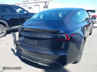 2025 Tesla Model 3 Long Range with VIN 5YJ3E1EAXSF940137, listed as a IAAI auction lot 41711018 with 544 mi miles. Bid and sale history available at carsss.com. Image 4.