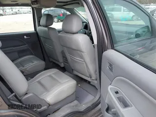 2005 Ford Freestyle SEL with VIN 1FMDK051X5GA72332, listed as a IAAI auction lot 41826384 with 171,719 mi miles. Bid and sale history available at carsss.com. Image 8.