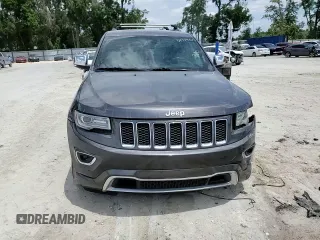 2014 Jeep Grand Cherokee Overland with VIN 1C4RJFCT7EC182234, listed as a Copart auction lot 54754465 with 185,658 mi miles and Salvage Title. Bid and sale history available at DreamBid. Image 15.