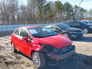 2015 Ford Fiesta Titanium z VIN 3FADP4FJ0FM184503, wystawiony jako IAAI lot #41332401 z przebiegiem 165 379 mil mil oraz . Historia ofert i sprzedaży dostępna na DreamBid. Obrazek 1.