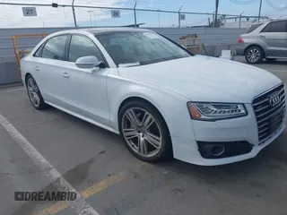 2016 Audi A8 Sport z VIN WAU43AFD3GN011061, wystawiony jako IAAI lot #42034532 z przebiegiem 109 877 mil mil oraz . Historia ofert i sprzedaży dostępna na DreamBid. Obrazek 1.