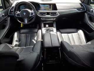 2021 BMW X5 xDrive45e with VIN 5UXTA6C09M9H50122, listed as a Copart auction lot 48162735 with 59,697 mi miles and Salvage Title. Bid and sale history available at carsss.com. Image 8.