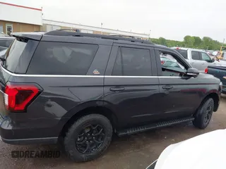 2022 Ford Expedition Timberline z VIN 1FMJU1RT5NEA03879, wystawiony jako IAAI lot #42065818 z przebiegiem 147 828 mil mil oraz . Historia ofert i sprzedaży dostępna na DreamBid. Obrazek 13.