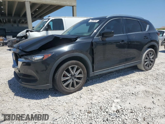 2018 Mazda CX-5 Touring with VIN JM3KFACM2J1327725, listed as a Copart auction lot 54894765 with 56,194 mi miles and Salvage Title. Bid and sale history available at carsss.com. Image 1.