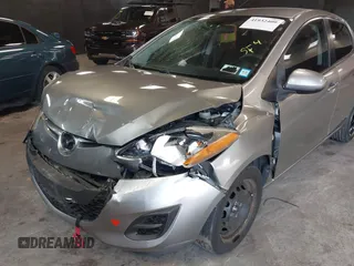 2012 Mazda 2 Sport with VIN JM1DE1KY7C0150803, listed as a IAAI auction lot 41932409 with 89,474 mi miles. Bid and sale history available at carsss.com. Image 6.