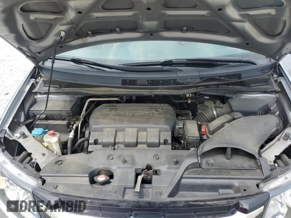 2016 Honda Odyssey EX-L with VIN 5FNRL5H65GB040719, listed as a Copart auction lot 54587295 with 231,302 mi miles and Salvage Title. Bid and sale history available at DreamBid. Image 12.