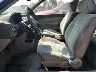 1992 Ford Escort z VIN 1FAPP11JXNW156984, wystawiony jako Copart lot #63462264 z przebiegiem 37 774 mil mil oraz Szkoda całkowita • Salvage title. Historia ofert i sprzedaży dostępna na DreamBid. Obrazek 7.