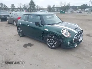 2019 MINI Hardtop Cooper S z VIN WMWXP7C50K2A52200, wystawiony jako IAAI lot #41807601 z przebiegiem 61 659 mil mil oraz . Historia ofert i sprzedaży dostępna na DreamBid. Obrazek 1.